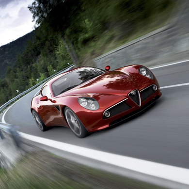 Photo of an Alfa Romeo car riding on the track
