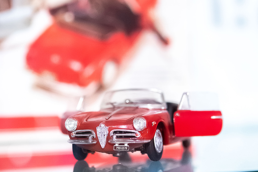 Photo of a little model of a red Alfa Romeo car
